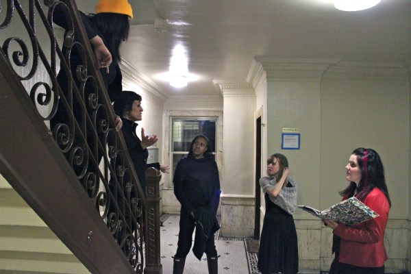 Vagina Monologues cast during rehearsal on the staircase in the main lobby of my building. (Photo by Patrick J. Paglen)