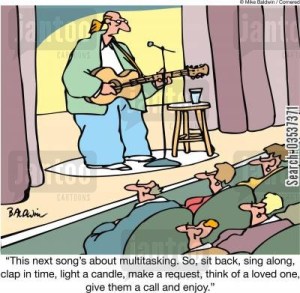 This next song's about multitasking. So, sit back, sing along, clap in time, light a candle, make a request, think of a loved one, give them a call and enjoy.